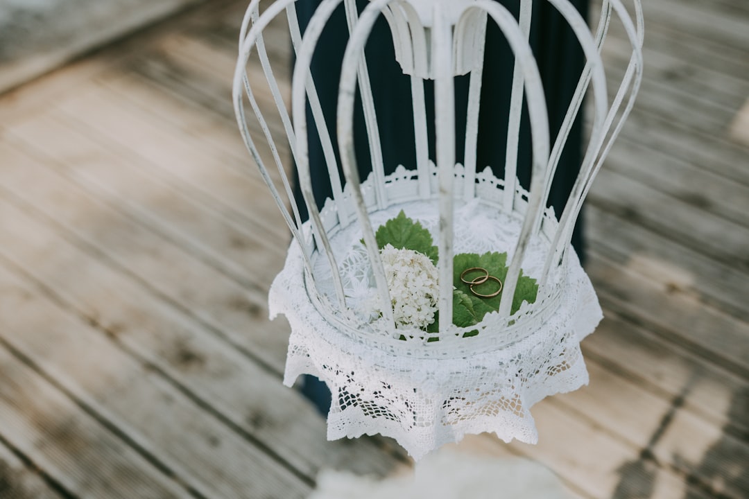 photo of ring inside white lantern decor