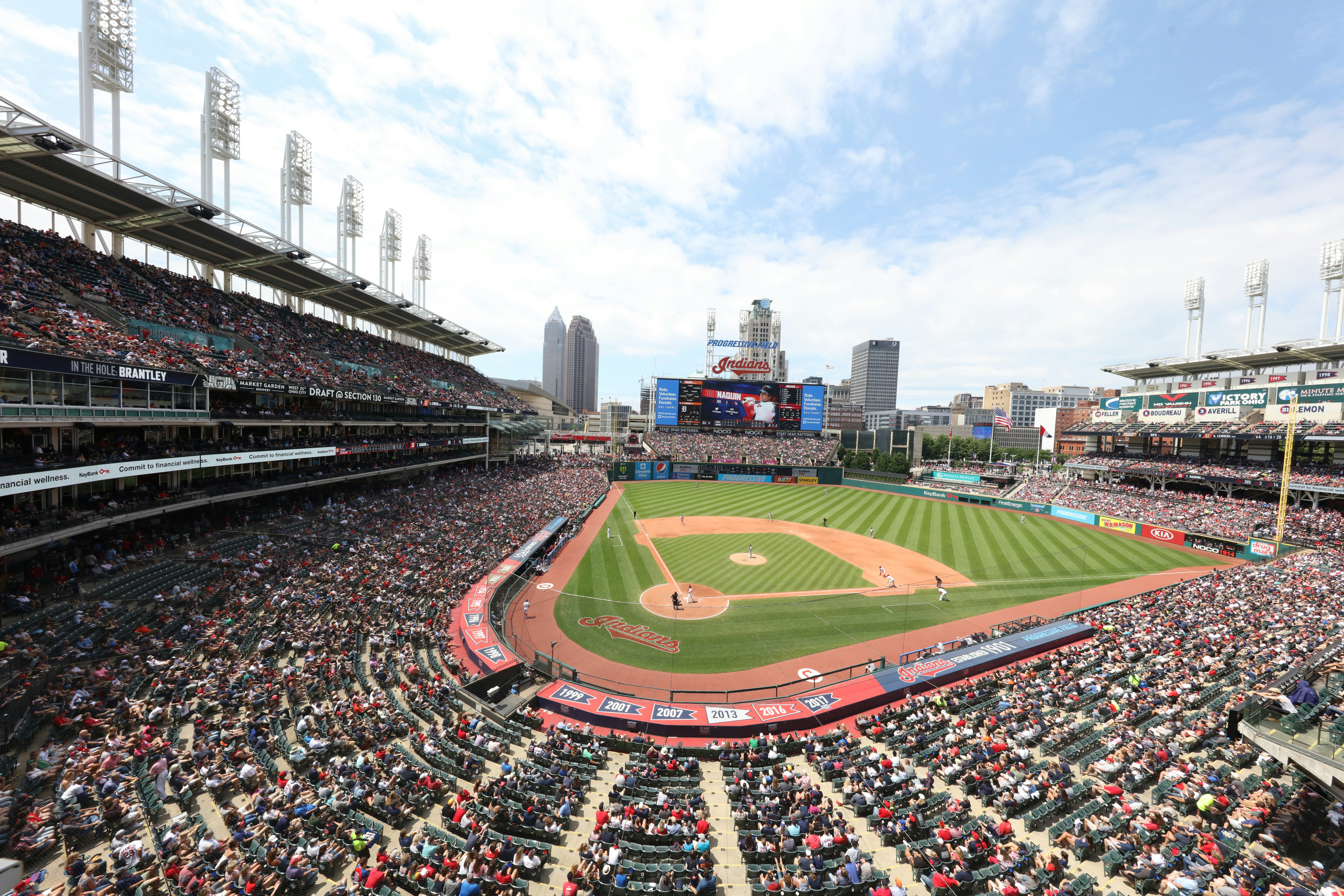 This is an extreme wide angle image taken from a high elevation showing the stadium and Cleveland skyline.