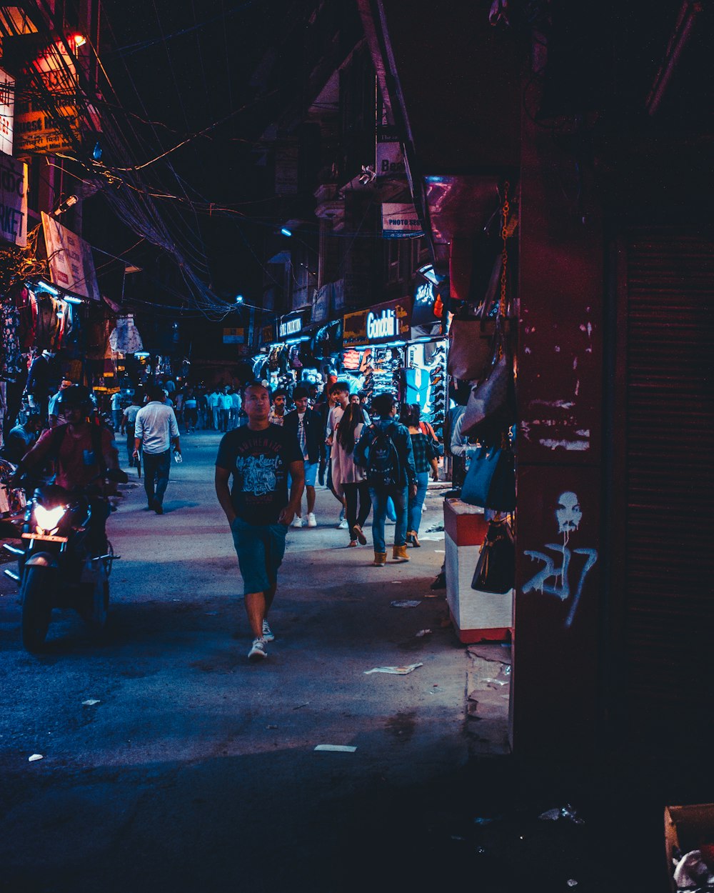 person walking on concrete road