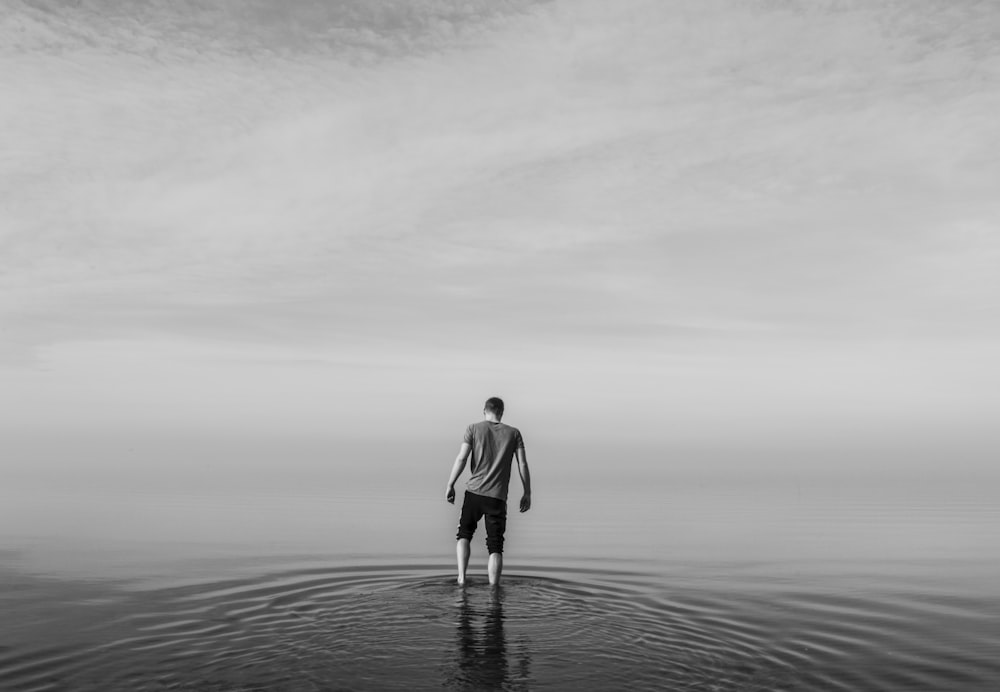 person standing in body of water