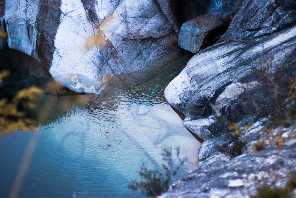 rocky mountain with body of water