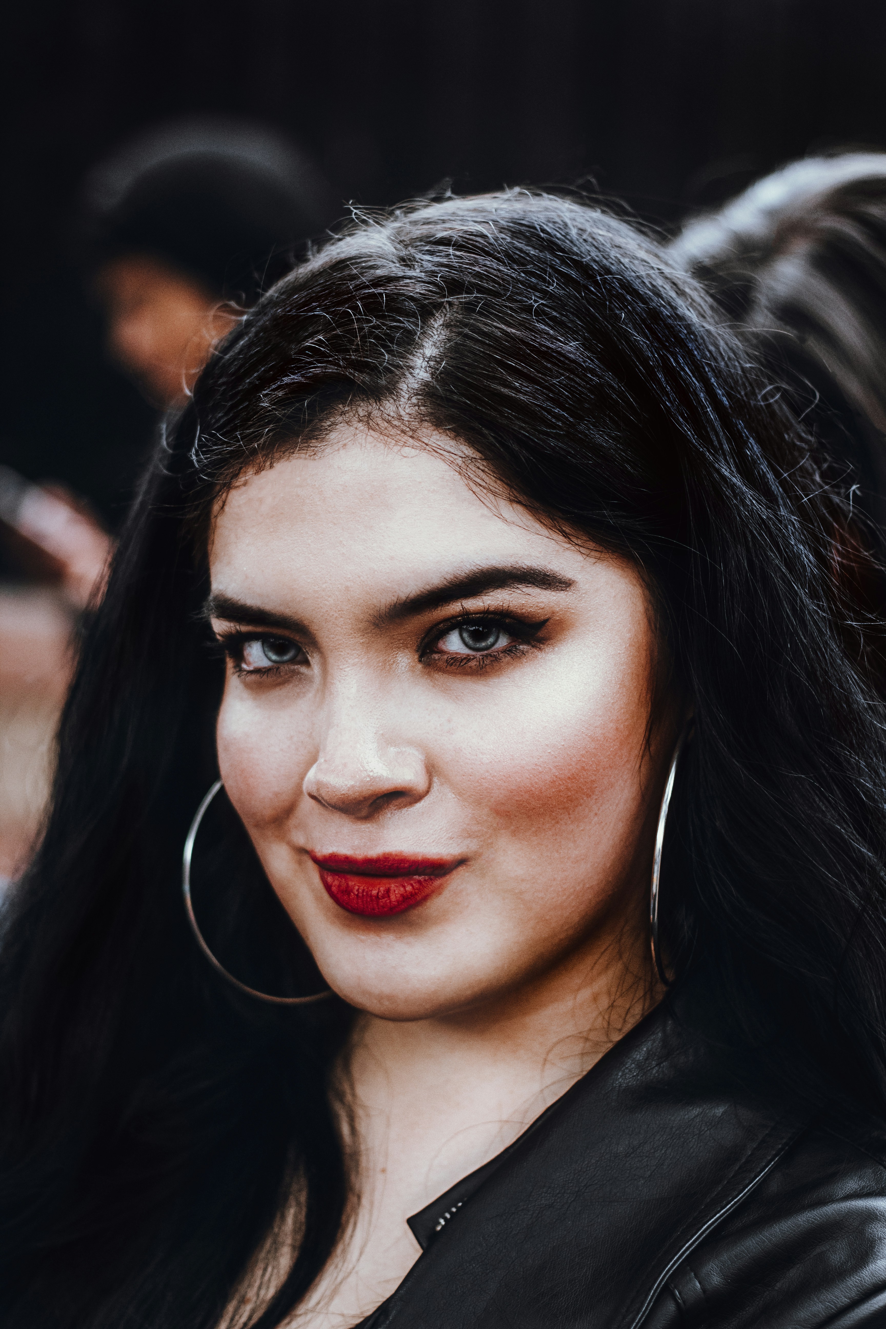 smiling woman taking photo