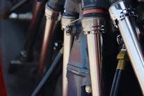 Close-up of clean, shiny plumbing pipes after repair work.