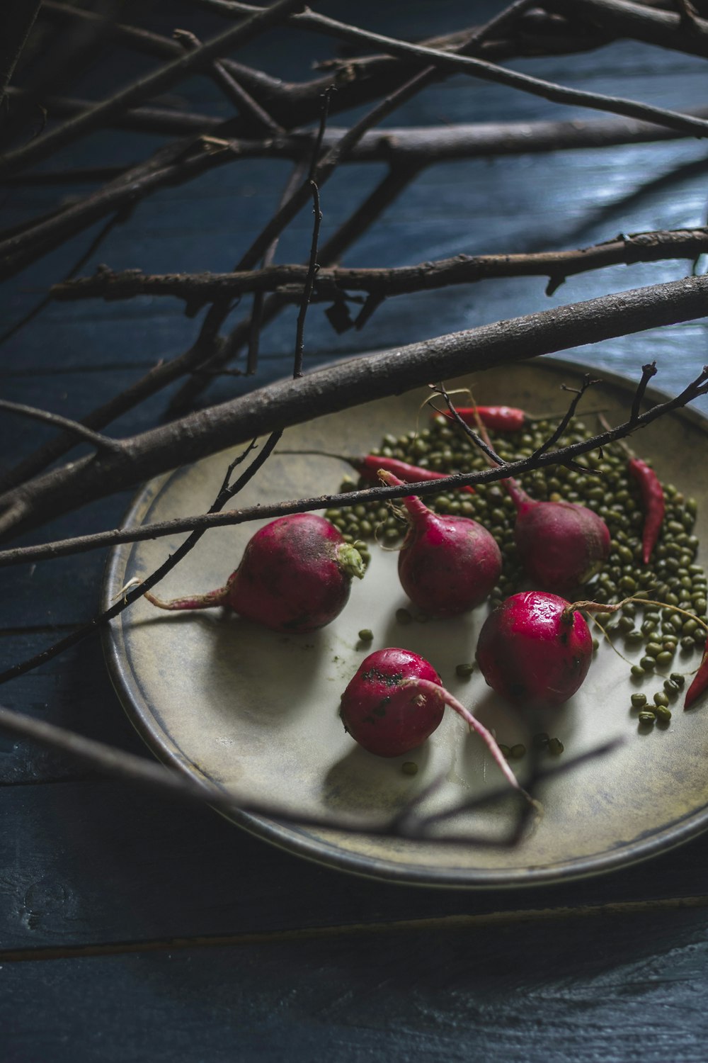 red fruits on plate