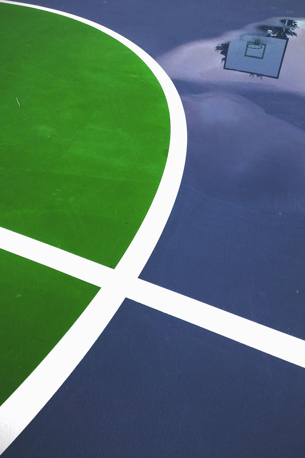 blue and green basketball court flooring