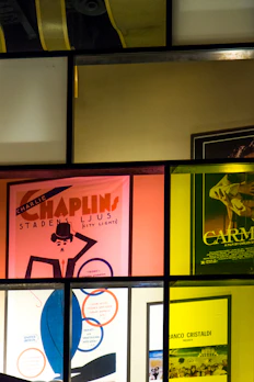Close-up of a vintage cinema poster featuring classic film artwork.