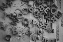 Illustration of emails being pulled out from a jumble of text.