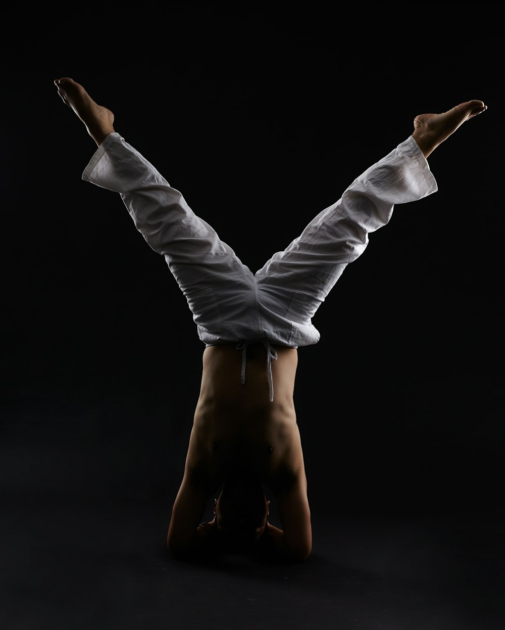 man doing head stand