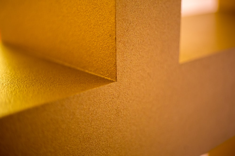 closeup photo of yellow wall