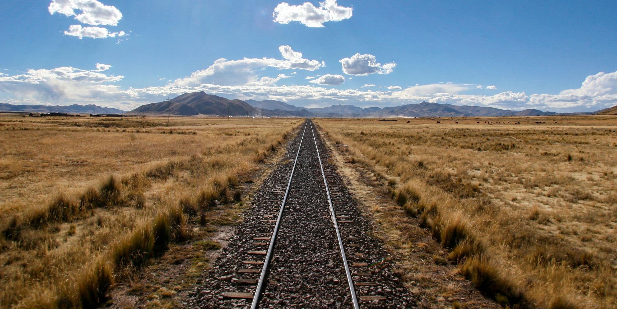 Looking off the back of a PeruRail train as we crossed the altiplano.