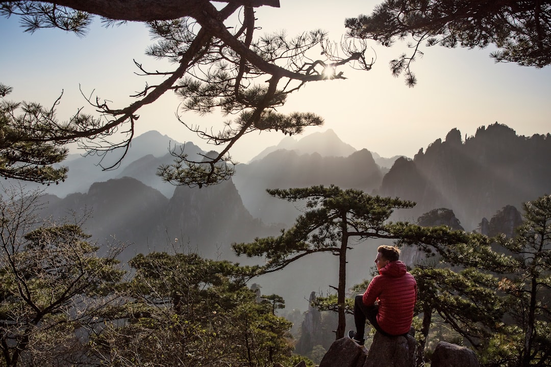 A quiet moment on Mount Huangshan after one of the most incredible sunrises I’ve ever witnessed. See more at www.morethanjust.photos