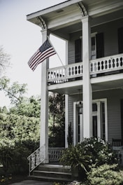 flag of USA on 2-storey house
