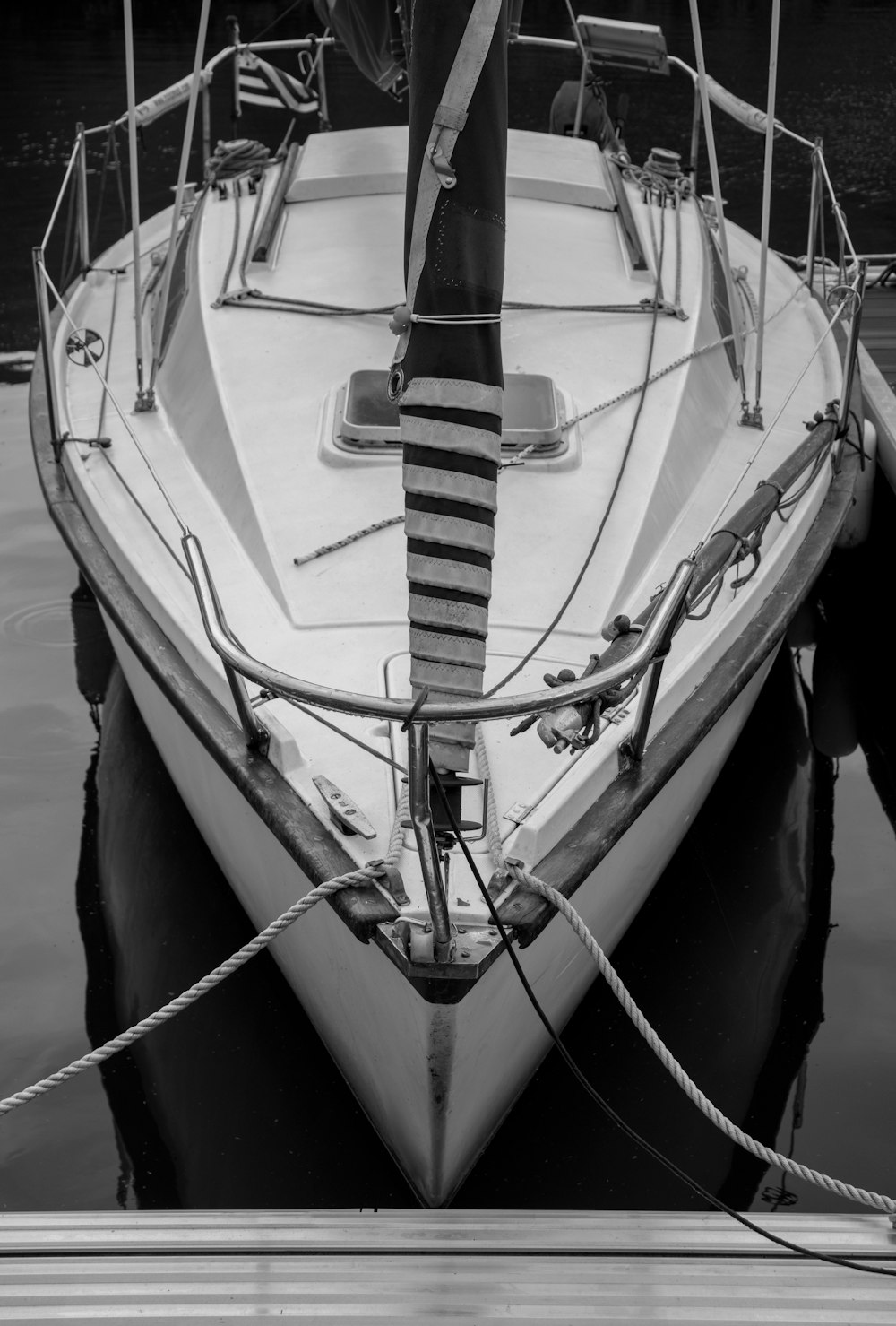 grayscale photography of powerboat
