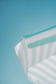white and green striped parasol during daytime photo