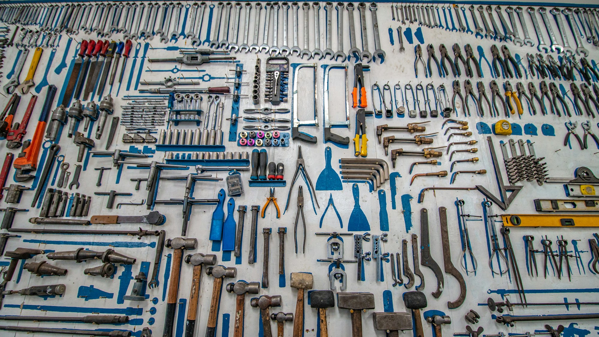 A large array of tools laid out neatly.