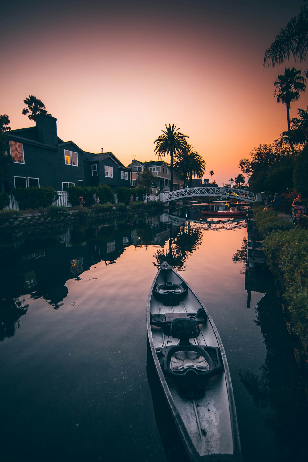 a small boat floating on top of a river