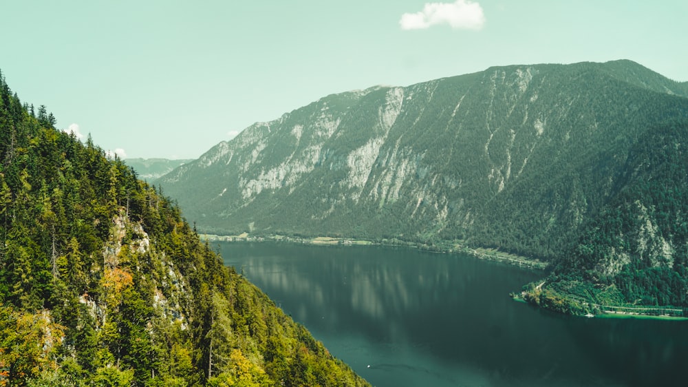 aerial view photo of mountains near body of water