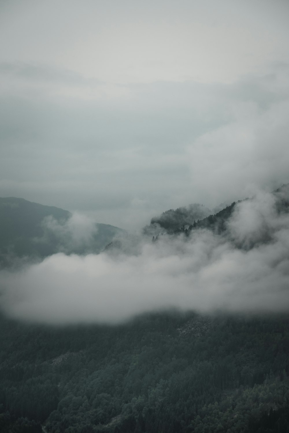 landscape photo of mountain with clouds