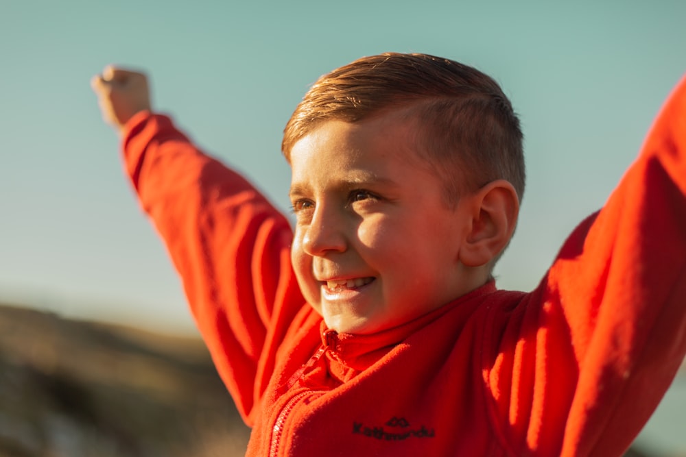 boy with red jacket