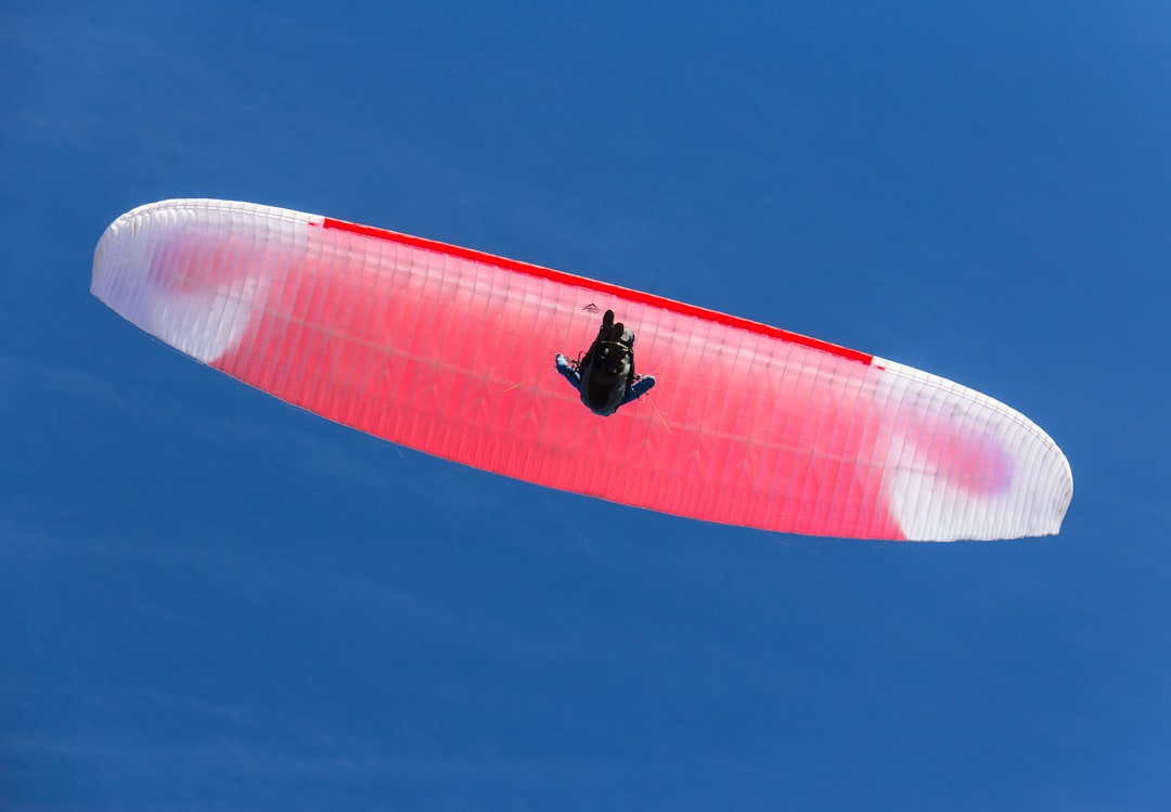 white and red parachute