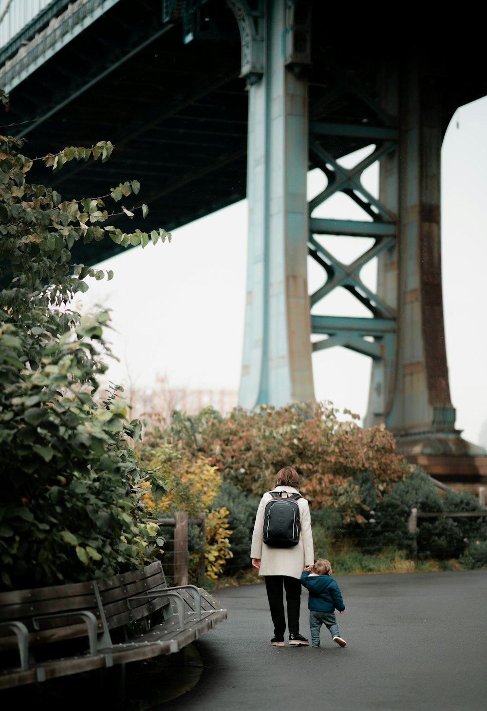 woman and child on park photo