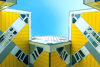 yellow painted building digital wallpaper