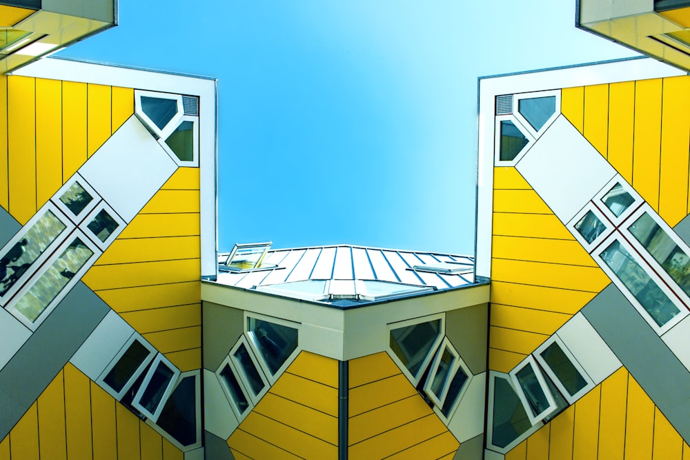 yellow painted building digital wallpaper