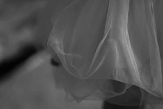 close-up photography of white mesh textile