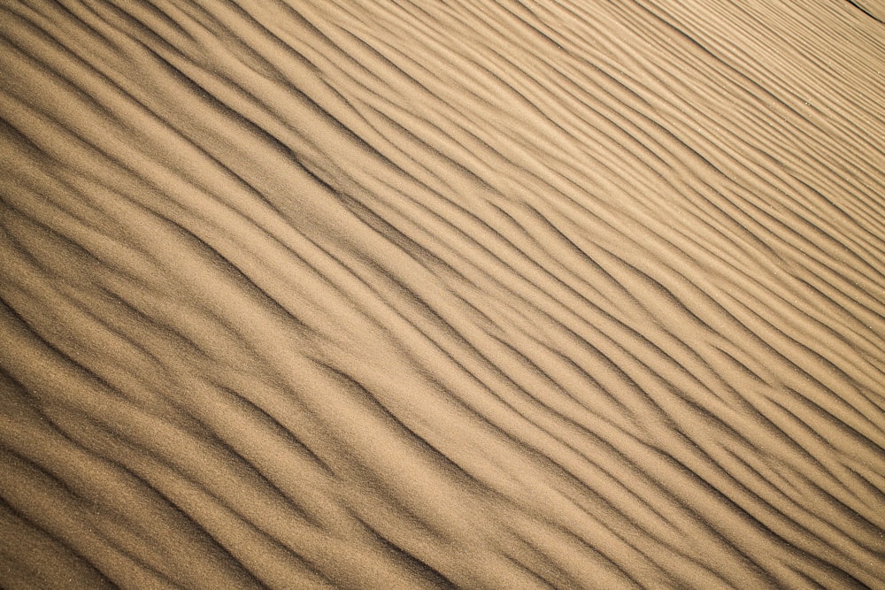 a large sand dune in the middle of a desert