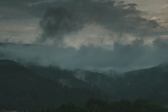 scenery of mountains covered with fog in Peggau Austria