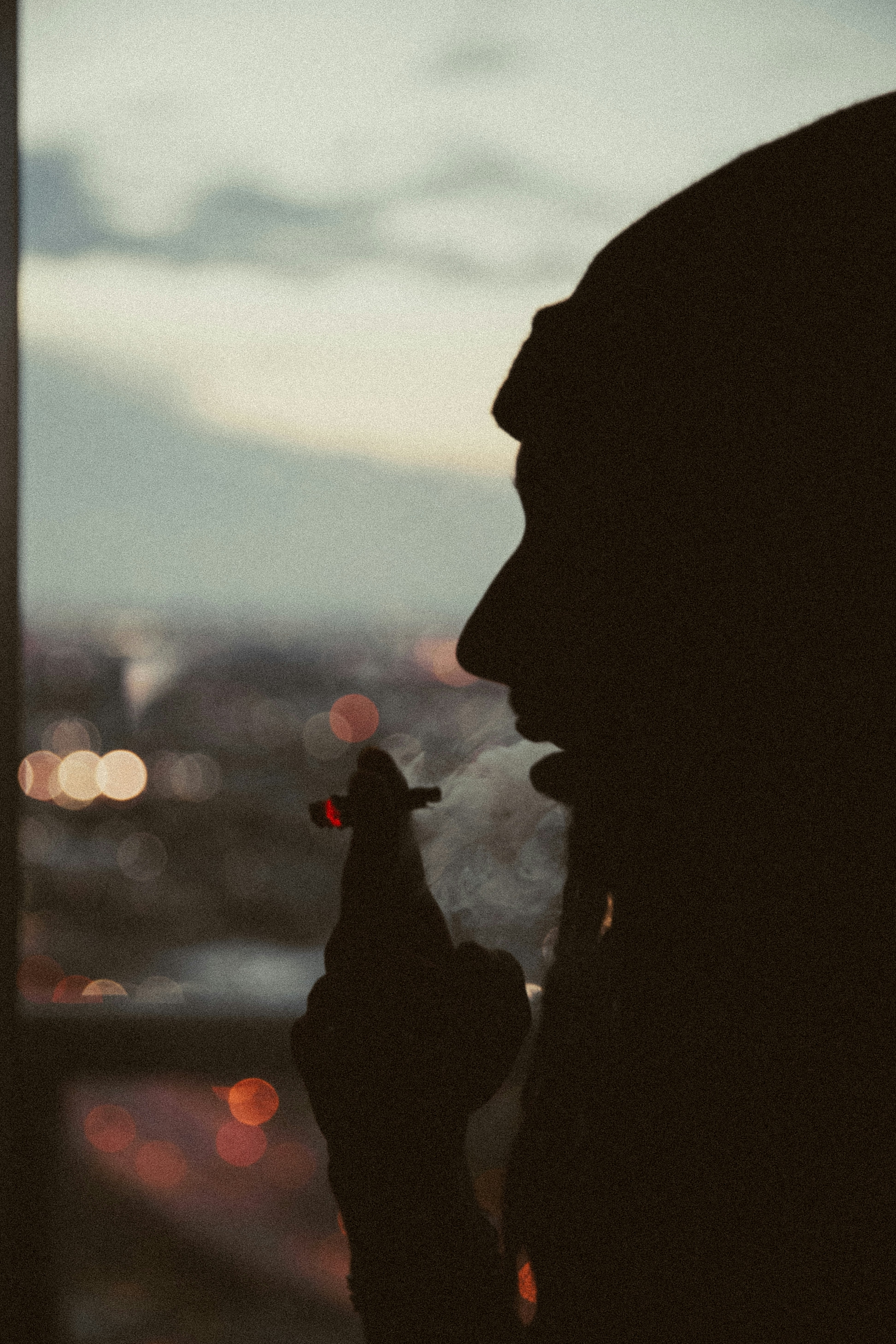 24-70mm F2.8 G SSM II sample photo. Person smoking marijana joint photography