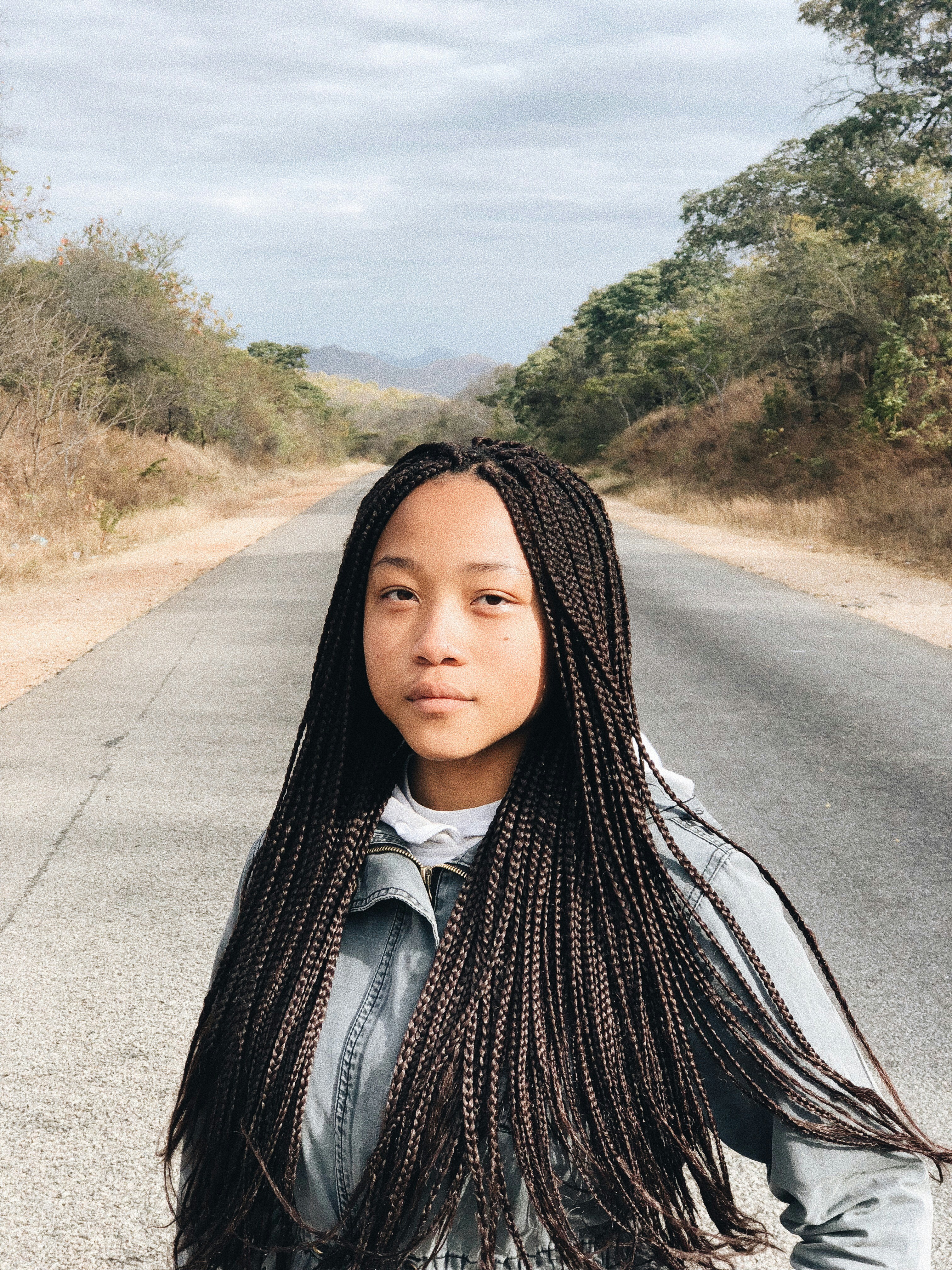 a woman wearing a wig because she has female pattern baldness in her 20s