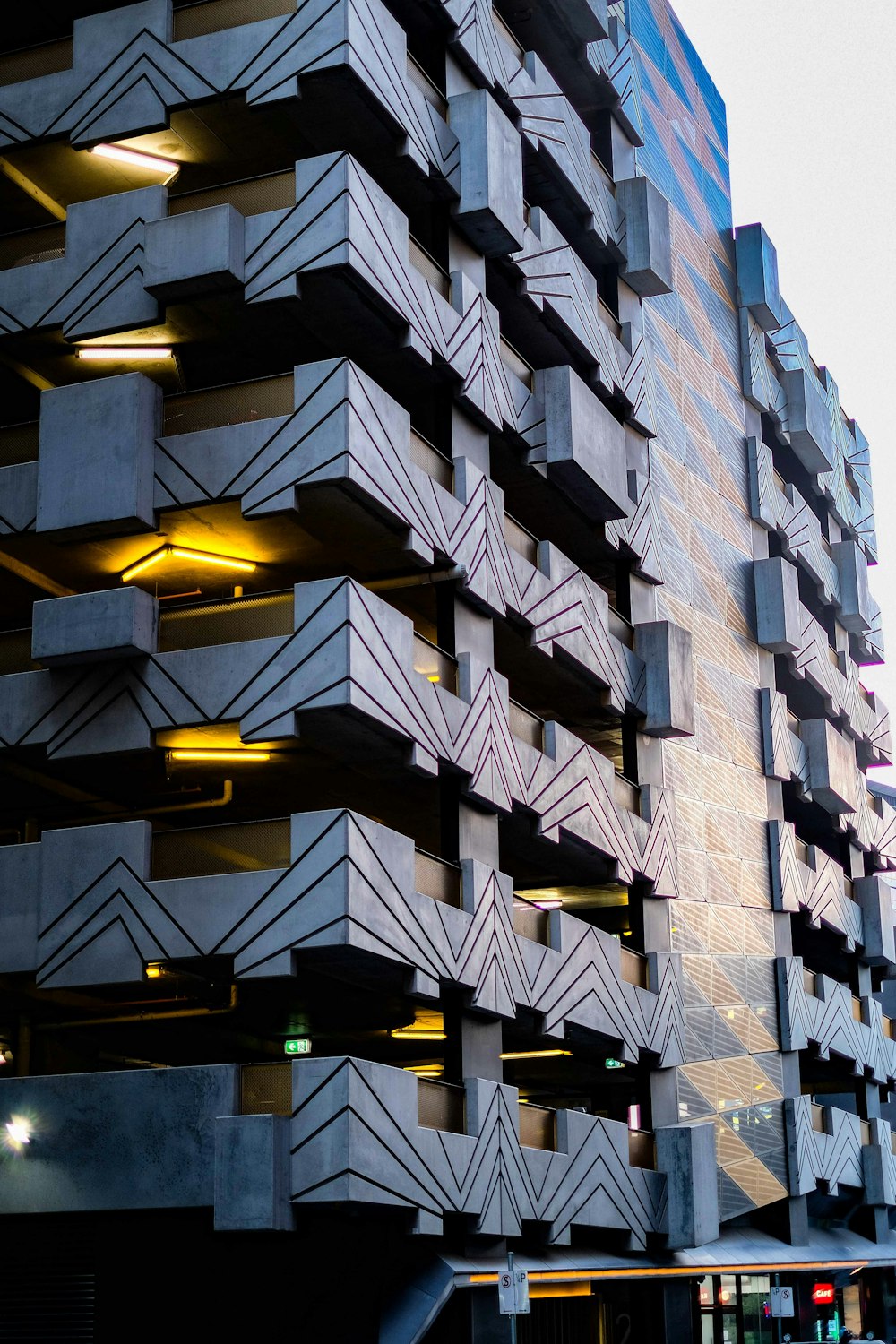 gray and brown building under cloudy sky