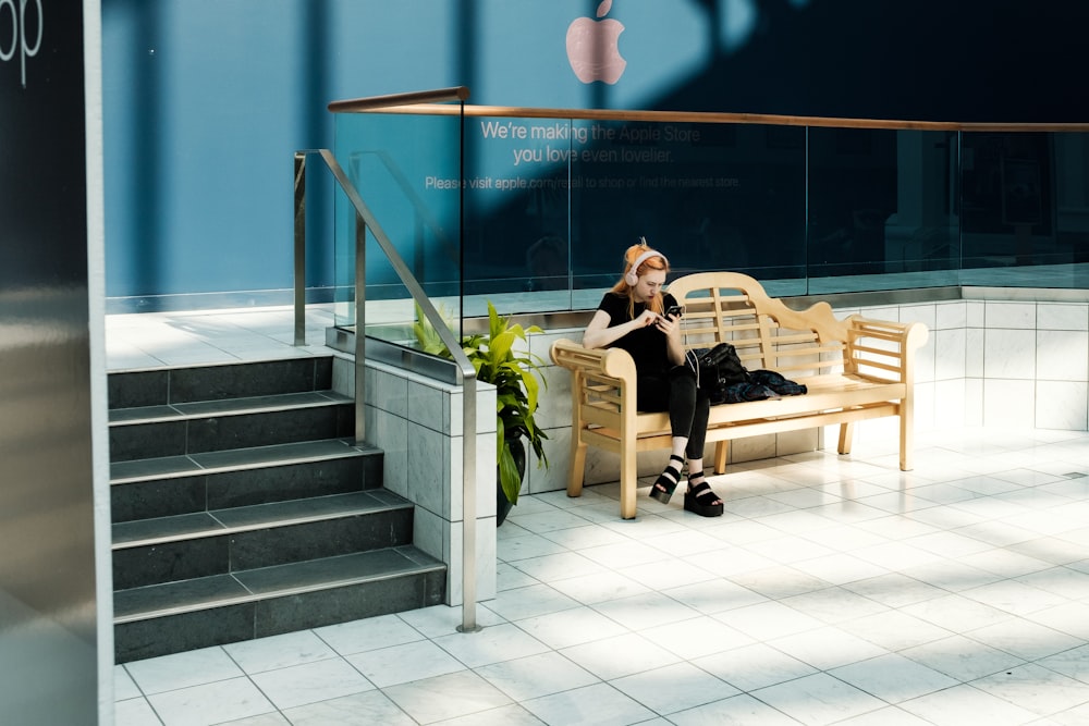 woman sitting on bench