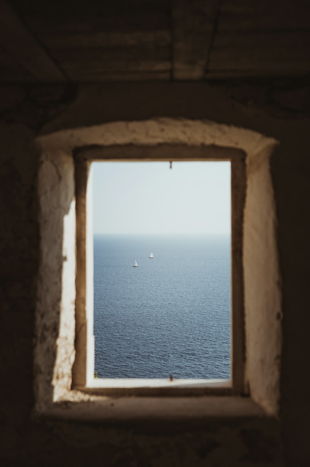 aerial photography of two sailboat on body of water during daytime