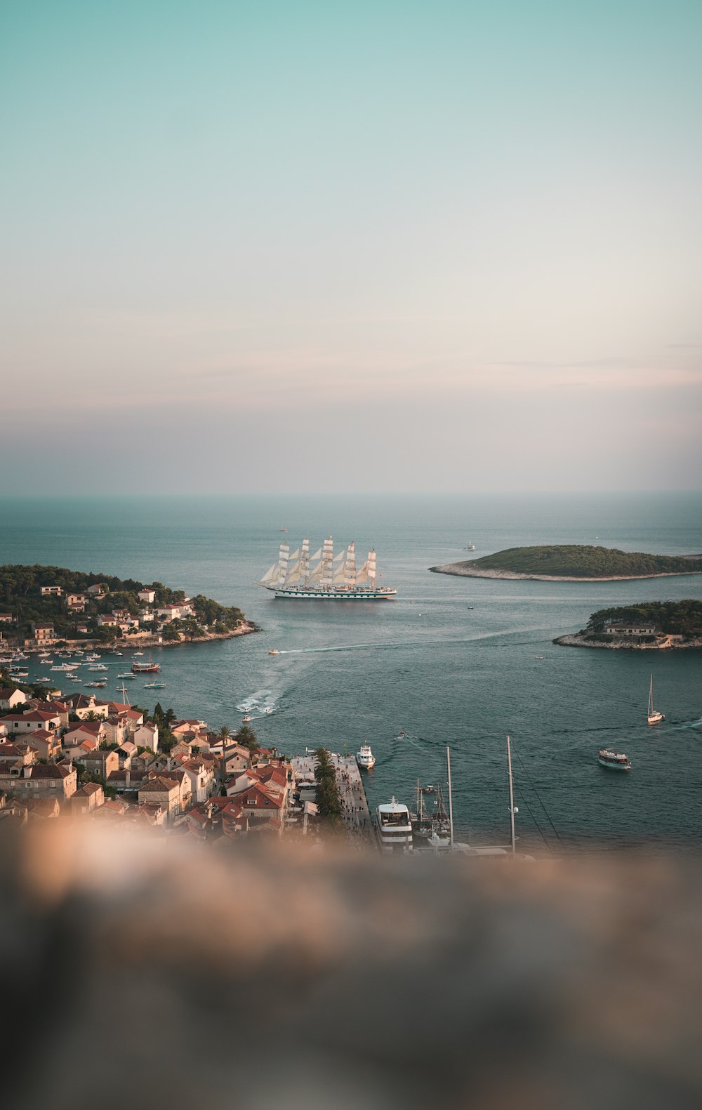 white and brown galleon ship on body of water