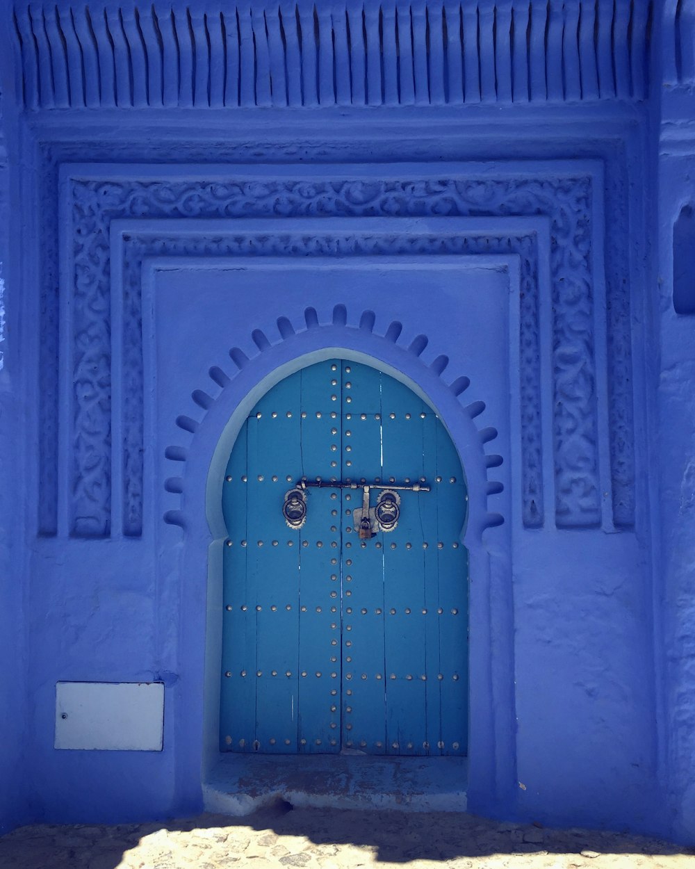 closed blue wooden door