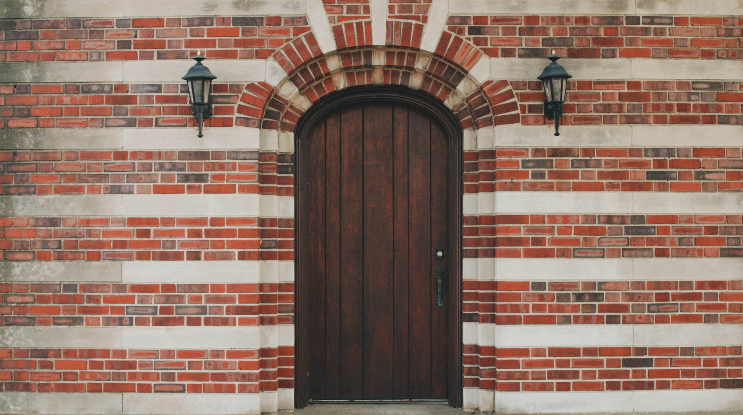 brown wooden door left closed