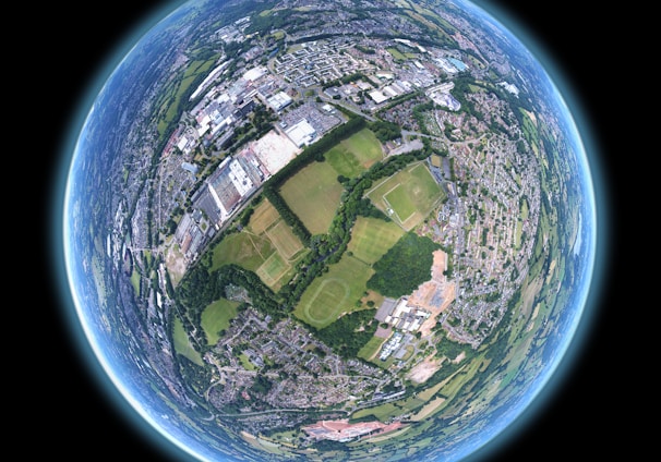 fish-eye aerial shot of buildings and trees