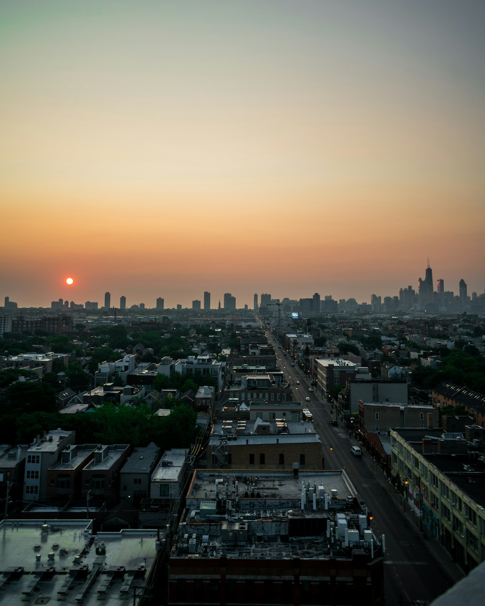 aerial view of buildings under sunset