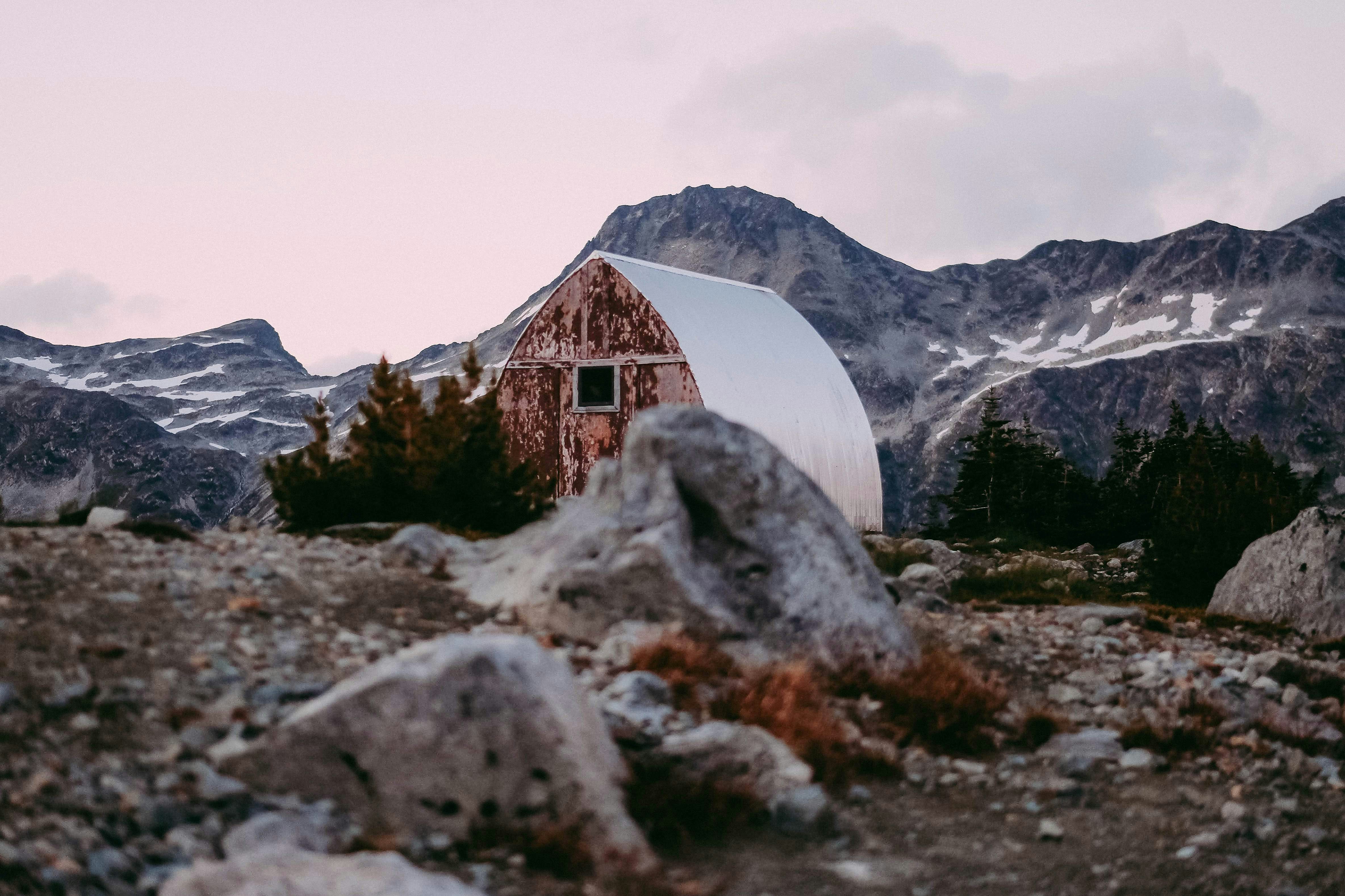 brown and white house on mountain