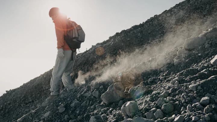 Trekker on a high ridge of Mount Rinjani