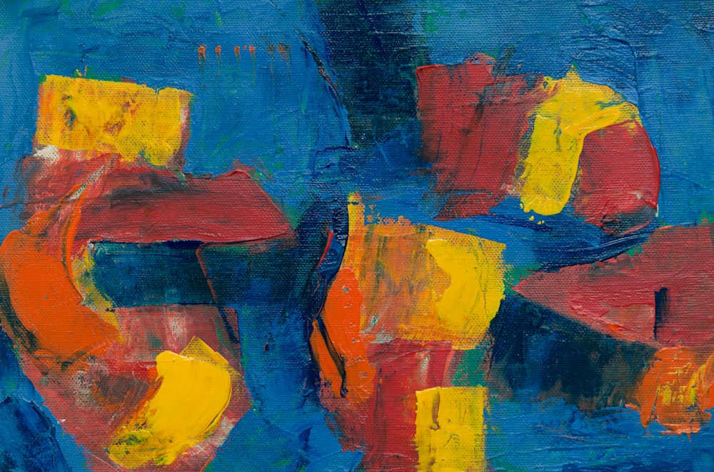 blue, red, and yellow abstract painting