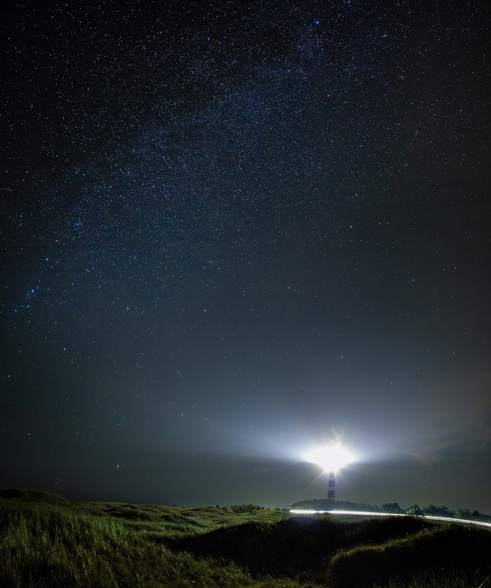 lighthouse during night time