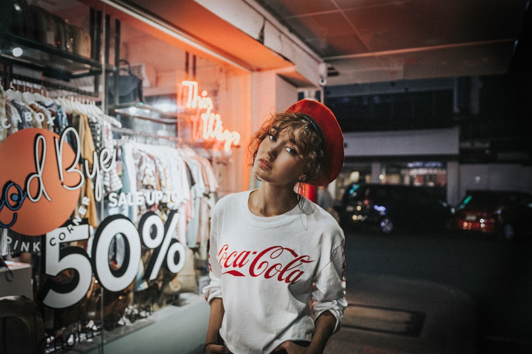 women's white Coca-Cola crew-neck shirt