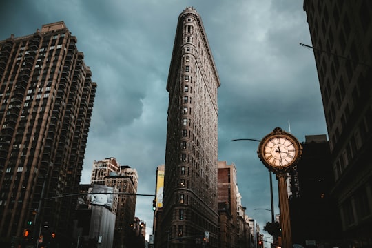 low-angle photography of buildings under cloudy sky in Madison Square Park United States