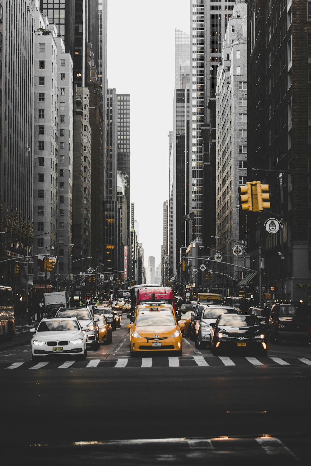 cars in between buildings