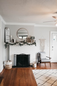 white fireplace mantel with decors