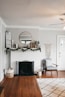 white fireplace mantel with decors