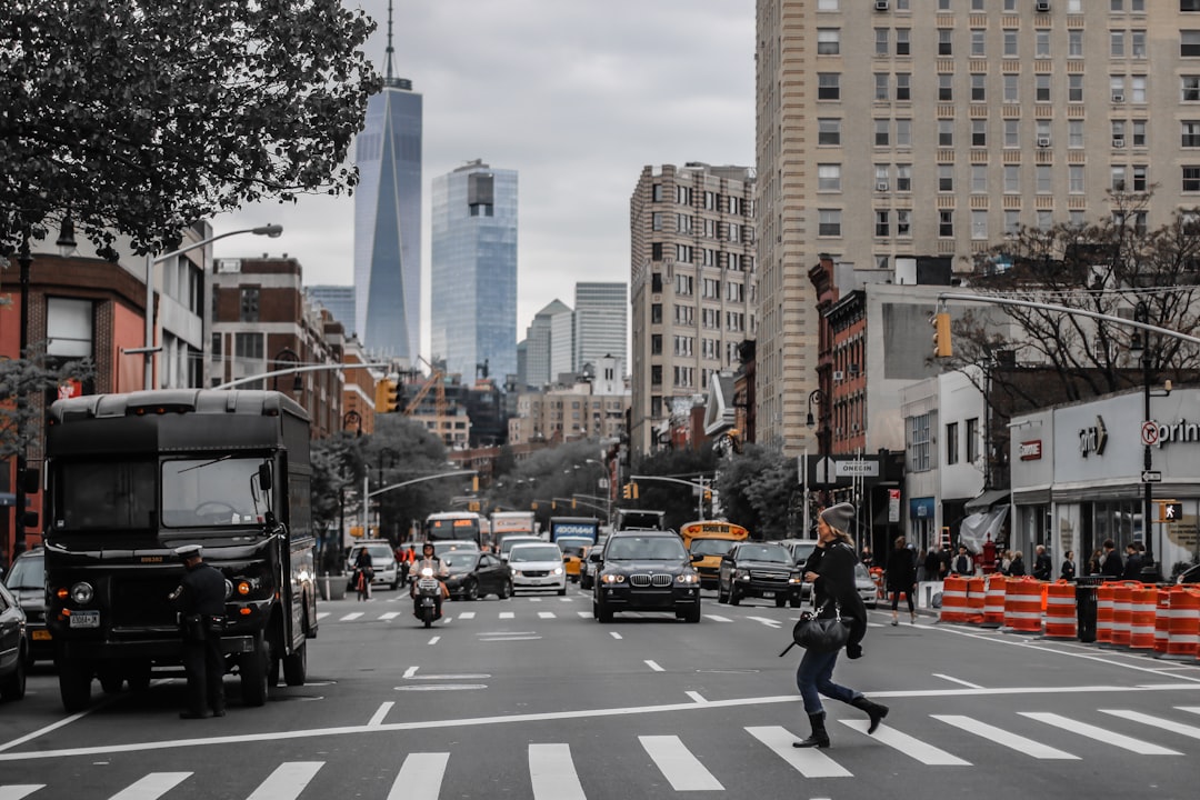 woman crossing street on pedestrian line